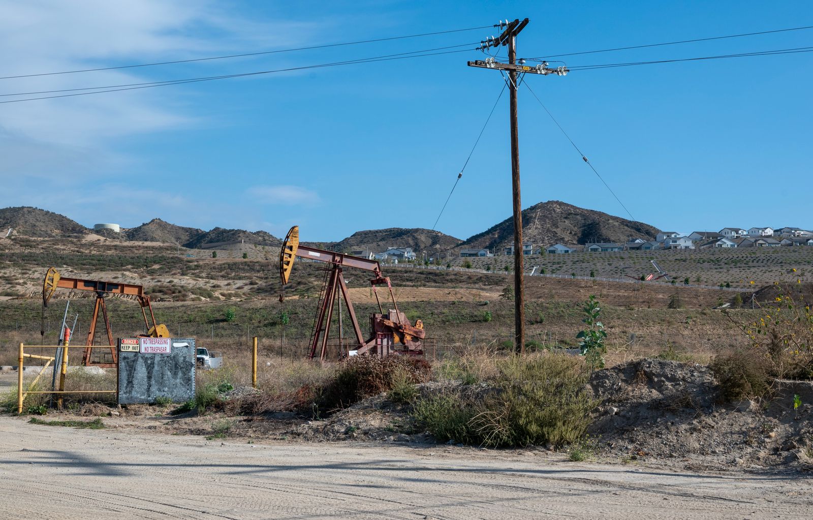 Pump jacks operating across an oil field